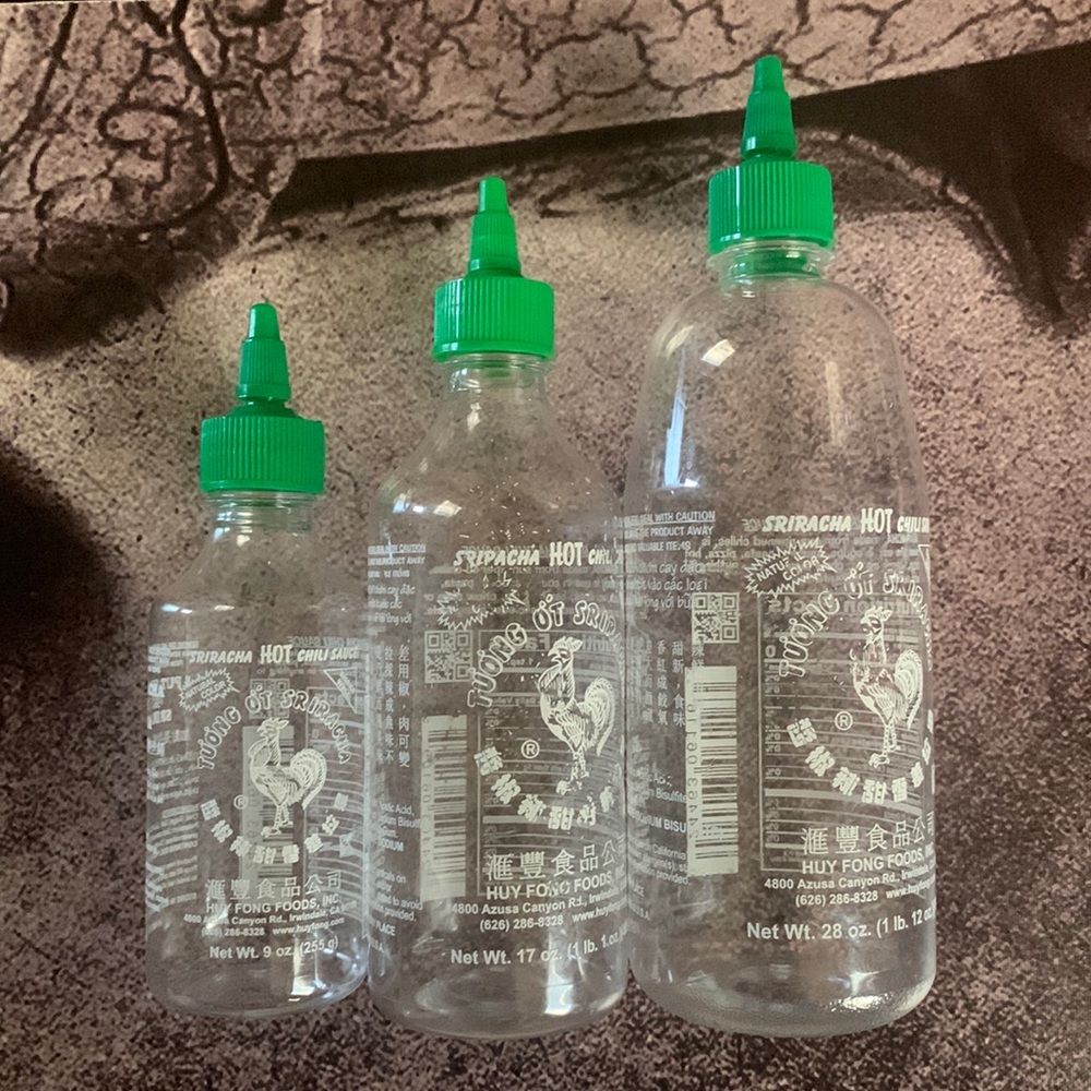 Empty Sriracha Bottles